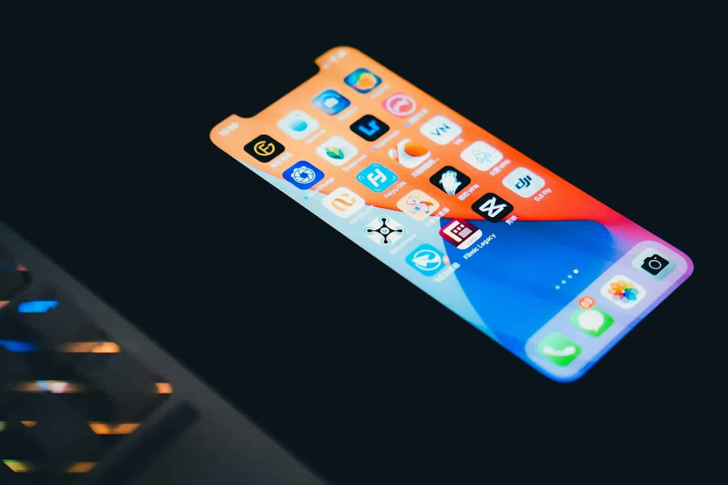 Smartphone screen displaying various colorful mobile application icons.